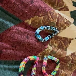 A set of three rainbow loom bracelets